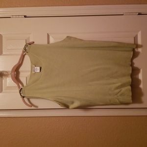 Light green sleeveless top with buttons on shoulders